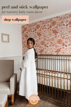 Image of a pregnant woman in a nursery with a feature wall with Peel and Stick Wallpaper from Loomwell Home Goods. Floral Baby Girl Nursery Wallpaper, Baby Room Wall Design, Blue Floral Wallpaper Nursery, Pink Floral Wallpaper Nursery, Boho Nursery Wallpaper Spoonflower, Room Wall Design, Flower Wallpaper Toddler Room, Wallpaper Feature Wall, Peal And Stick Wallpaper