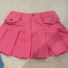 Brand New Never Worn Pink Mini Skirt With Pockets For Spring, Spring Pink Mini Skirt With Pockets, Trendy Spring Skort, Y2k Spring Mini Skirt With Pockets, Spring Y2k Mini Skirt With Pockets, Summer Pink Mini Skirt With Pockets, Y2k Style Mini Skirt With Pockets For Spring, Y2k Mini Skort For Spring, Spring Y2k Mini Skort