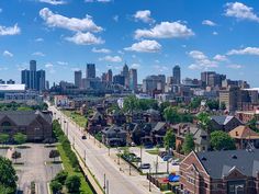 an aerial view of a city with tall buildings