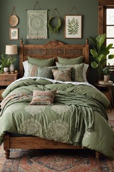 a bed with green comforter and pillows in a room