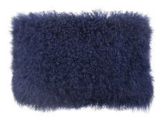 a dark blue fluffy pillow on a white background