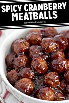 a white bowl filled with meatballs covered in bbq cranberry meatballs