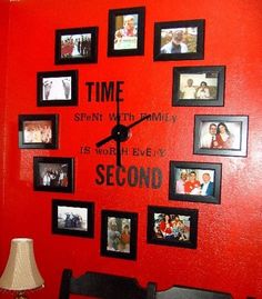 a red wall with pictures on it and a clock that says time spent with family