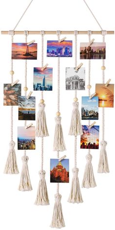 a hanging photo frame with tassels and pictures