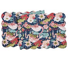 four placemats with flamingos and flowers on them