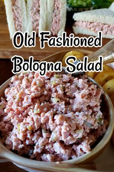 old fashioned bologna salad in a bowl on a plate with breadsticks next to it