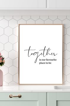 a white framed poster with the words together is our favorite place to be on it