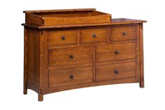 a wooden dresser with many drawers on the bottom and top drawer open to reveal a changing table