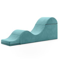 a blue chair that is shaped like a wave