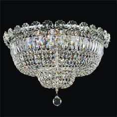 a crystal chandelier hanging from the ceiling