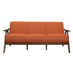 an orange couch sitting on top of a wooden frame