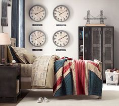 an image of a bedroom with clocks on the wall