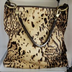 Garnett Hill Leather And Animal Print All-In-One Bucket Bag In Brown With Gold Hardware. Perfect To Dress Up Or Down. This Bag Is Sized To Fit All Essentials And More. Brown Shoulder Bag With Animal Design For Daily Use, Brown Shoulder Bag With Animal Design For Shopping, Brown Animal Design Shoulder Bag For Daily Use, Brown Animal Design Shoulder Bag For Shopping, Everyday Brown Shoulder Bag With Animal Design, Brown Animal Design Tote Shoulder Bag, Brown Rectangular Shoulder Bag With Animal Design, Brown Animal Design Rectangular Shoulder Bag, Animal Print Bag Outfit