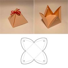 an origami box with a bow on the top and another box in the middle