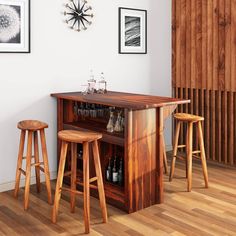 a bar with three stools in front of it