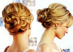 two women with blonde hair in formal hairstyles