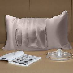 a pillow and some other items on a table