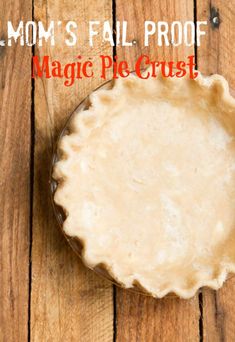 a pie crust sitting on top of a wooden table with the words mom's fail proof magic pie crust