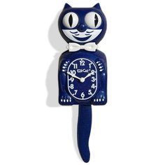 a blue clock with a cat face on it's face is shown in front of a white background