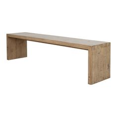 a wooden bench sitting on top of a white wall