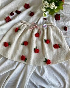 Our products are specially designed by our Leilayca brand and are 100% original and 100% handmade. This delicately designed cute red rose crochet skirt is knitted with cotton threads. The floral patterns on it are also knitted with cotton threads. ** This is a unique piece and has been knitted just for you. Perfect for day and night wear, summer/spring, spas/summer days, beaches and festivals. This unique skirt can be worn anywhere in any season. Waist width is adjustable. A unique gift for you Crochet Circle Skirt, Red Rose Crochet, Unique Skirt, Crochet Circle, Unique Clothes, Rose Crochet, Unique Skirts, Rose Skirt, Flared Mini Skirt