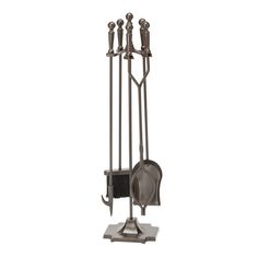 a metal fireplace tool holder with three tools on it's sides and two shovels hanging from the back