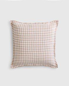 a brown and white gingham pillow