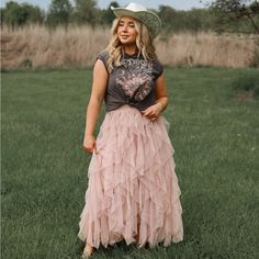 Brand New. An Elegant Blush Pink Colored Midi Skirt With Voluminous Shift Material With Ruffle Detailing, An Elastic Waistband, And A Tiered Silhouette That Falls Into A Full Mid-Calf Cascade. Waist: S 24” M 26” L ”30” Photos Are Our Own And Display The Exact Item You Will Receive. Cart With Confidence! Wedding Guest Skirt Special Ocassion Spring Summer Vacation Outfit Cruise Resort Clothing Boho Cowgirl Fashion Fairy Cottage Clothing Tulle Maxi Skirt Long Skirt Princess Bodice Fairytale Cottage Tops With Tulle Skirts, Tulle Skirt With Tshirt, Pink Lace Skirt Outfit, Pink Western Quinceanera, How To Style A Floral Skirt, Country Skirt Outfits, Country Chic Wedding Outfit Guest, Barn Wedding Guest Outfit, Tule Skirt Outfit