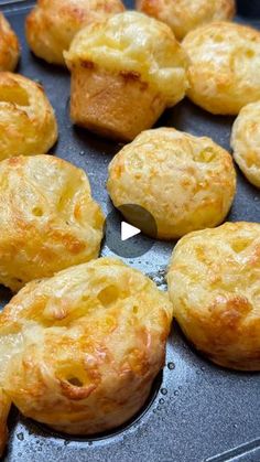 some food that is in a pan on a table and has been cooked to make it look like they are coming out of the oven