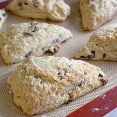 several scones on a baking sheet ready to be baked