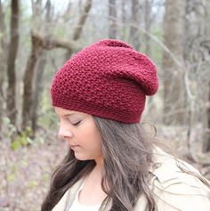 THE DENALI This crocheted Slouchy Hat style is called the Denali. This hat is so soft & cute! It features a slouchy look in the back, and a crochet band around the bottom to ensure a perfect fit! COLOR: The color shown is Berry, a beautiful shade of maroon. A perfect pop of color for nearly any chilly-weather outfit! Please select the color you prefer in the drop-down menu when ordering; the color chart is available in the last picture. MATERIAL: This item is made of high quality 100% acrylic yarn. Very soft! SIZE: One size fits most, as the pattern is stretchy.  CARE: This hand-made hat should be hand-washed in cold water, and always lay flat to dry.  PACKAGING: All items are folded and wrapped with tissue paper and a yarn bow, perfect for gift giving (for someone else, or yourself)! KEEP Red Beanie Crochet, Red Crochet Wide Brim Hat, Red Wide Brim Crochet Hat, Red Beanie Hat, One Size Fits Most, Red One Size Beanie Hat, Red Slouchy Hat For Winter, Slouchy Red Hat For Winter, Red Slouchy Winter Hat, Slouchy Red Winter Hat