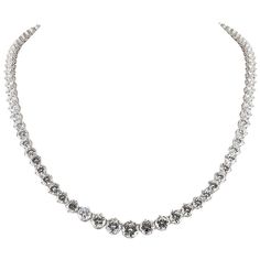 Diamond riviera necklace, finely crafted in platinum, featuring Round Brilliant cut diamonds, weighing a total of approximately 41.00 carat. The 7 front stones are GIA certified; 2.06 carat F color SI1 clarity, 1.57 carat D color VS1 vlarity, 1.50 carat E color VVS2 clarity, 1.42 carat G color VS1 clarity, 1.41 carat F color VS1 clarity, 1.16 carat D color VS1 clarity, 1.11 carat D color VVS2 clarity. Expensive Diamond Jewelry, Riviera Necklace, White Diamond Jewelry, Expensive Diamond, Vintage Beads Necklace, Boot Jewelry, Halloween Painting, Expensive Jewelry, Cute Necklace