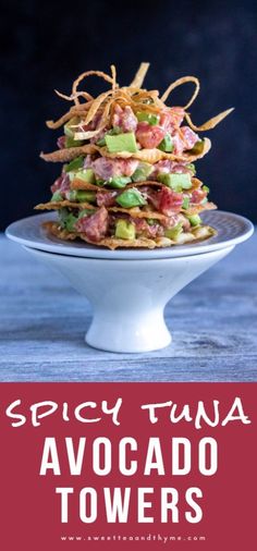 spicy tuna avocado towers on a plate with text overlay that reads spicy tuna avocado towers