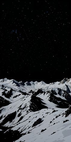 snow covered mountains under a night sky with stars