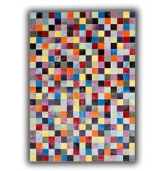 a multicolored rug with squares on it