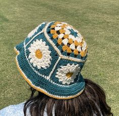 Embrace the charm of blooming daisies with our delightful handmade crochet bucket hat! Featuring a whimsical daisy motif, this hat adds a cheerful touch to any outfit while providing both style and sun protection.  🌼 Made with 100% cotton and crafted with care, it's perfect for brightening up your day, whether you're out in the sun or simply enjoying a leisurely stroll.🌼 One size fits most. If you have specific sizing needs, please feel free to contact us! Custom Colors are now available!💜💚 Fall Hats, Crochet Bucket Hat, Flower Hats, Hats Vintage, Handmade Crochet, Granny Square, Bucket Hat, Caps Hats, Hand Knitting