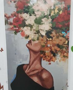 a painting of a woman's head with flowers in it