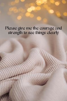 a blanket with the words, please give me the courage and strength to see things clearly