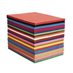 a stack of multicolored papers on a white background