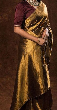 This plain golden Chanderi saree radiates a royal and elegant look with its rich and pretty color.  ✨ . The luxurious fabric exudes sophistication, making it perfect for festive occasions or celebrations. The blouse can be stitched with an additional cost, completing the ensemble with a tailored fit. 🌟 Don't just wear a saree; own the spotlight with Poonam Sarees! 💫🛍️ #SareeStar #GlamInSilk Fabric: Pure Silk Colour: Same as picture Work: Handwoven Chanderi Wash Care: Dry Clean NOTE: Expect mi