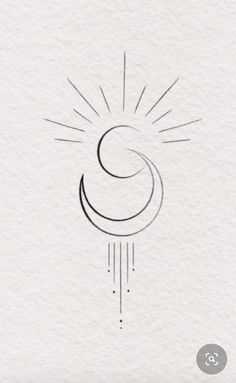 a drawing of the sun and moon on white paper with water drops coming from it