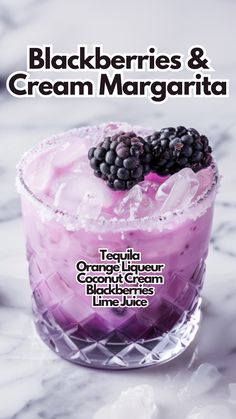 blackberries and cream margarita with ice in a glass on a marble countertop, text reads blackberryes & cream margarita