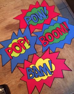 some stickers that say pop boom and pow