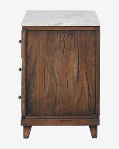 an old wooden cabinet with marble top and handles on the bottom, against a white background