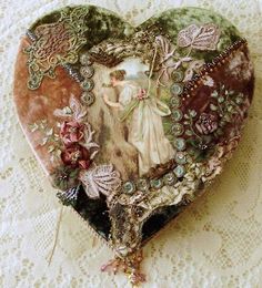 a heart shaped box with an image of a woman and flowers on it