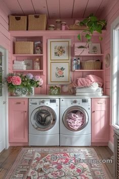 a washer and dryer in a pink laundry room with flowers on the shelves