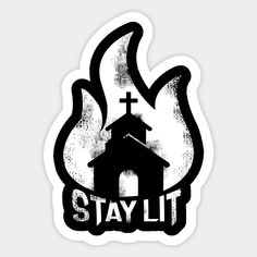 a black and white sticker with the words stay lit in front of a church