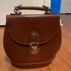 Vintage Brown Handbag/Crossbody Bag. Real Leather Bag, Never Used, Just Been In The Closet For A While. The Bag Is Missing The Strap, So You Could Get A New One Or Just Use It As Handbag. Vintage Flap Bag For Everyday Use, Elegant Satchel Backpack For Everyday Use, Vintage Crossbody Bag With Top Carry Handle, Vintage Backpack With Removable Pouch, Classic Shoulder Bag With Detachable Handle And Backpack Shape, Vintage Shoulder Bag Backpack With Detachable Strap, Vintage Backpack Shoulder Bag With Detachable Strap, Formal Satchel Saddle Bag With Detachable Handle, Saddle Bag With Top Handle For Daily Use