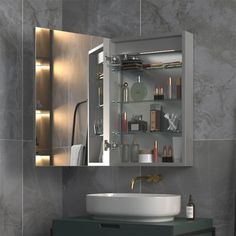 a bathroom with a sink, mirror and shelves on the wall above it is shown