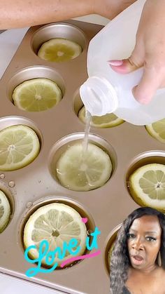 a woman is pouring lemons into a muffin tin